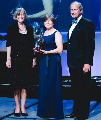 (L-R) Lynn Coakley, Margo Dewkett, 2013 Humanitarian Award Recipient, and John Long. Photo courtesy of Adam Brennan/USEF.